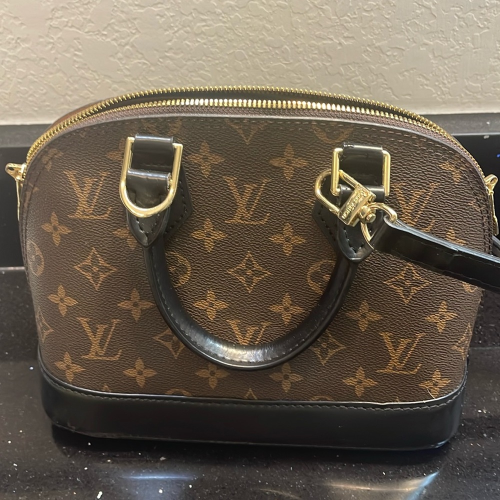 Dark brown leather cross body purse